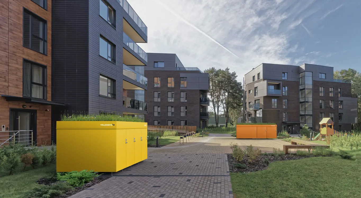 zwei VELODEPO mit Biodiversitätsdach in einer Wohnanlage, fotorealistische Visualisierung